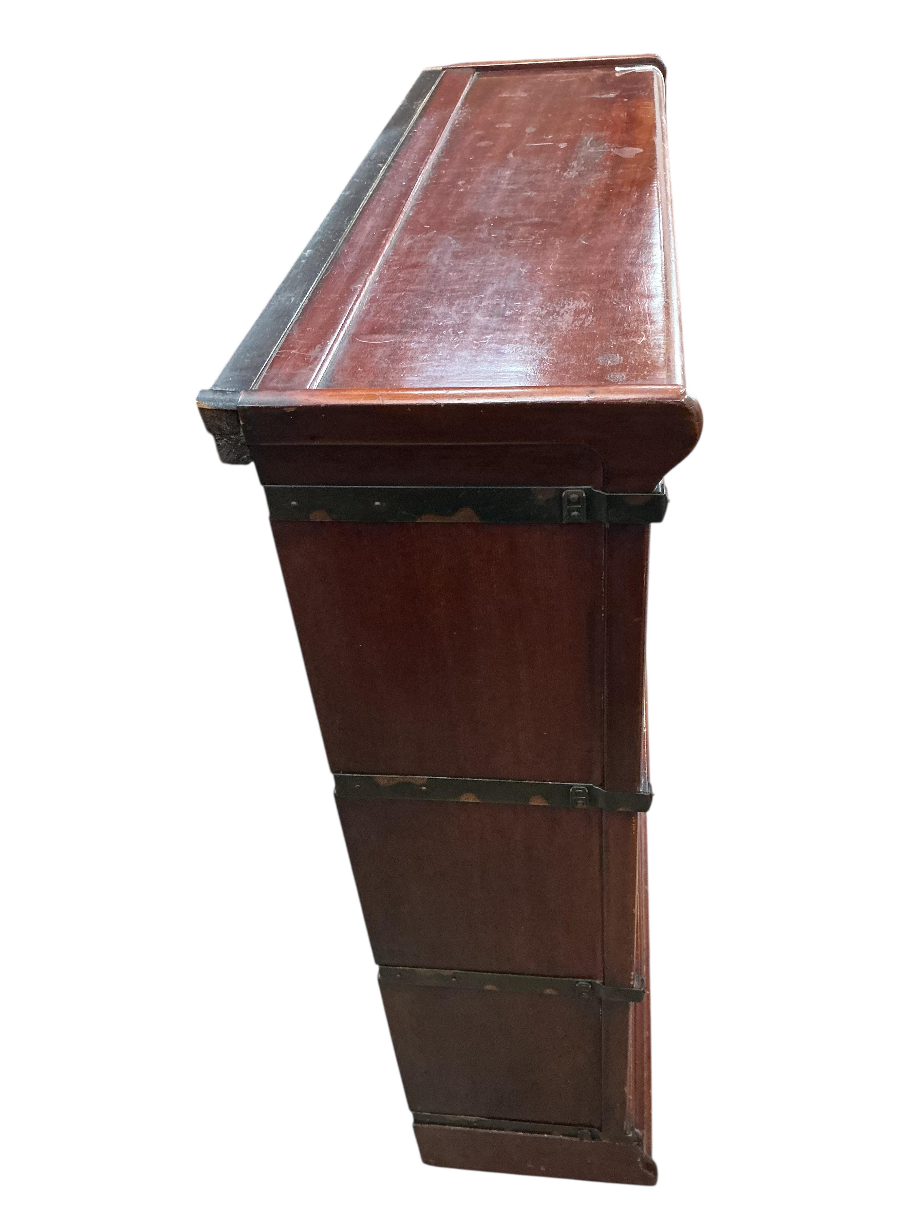 A Globe Wernicke mahogany three section bookcase, width 86cm, depth 29cm, height 102cm